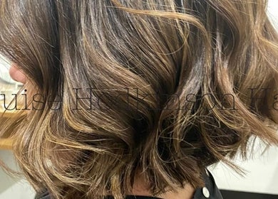 Stylish wavy hair at Louise Hodkinson Hair in Yeerongpilly, Queensland, AU.