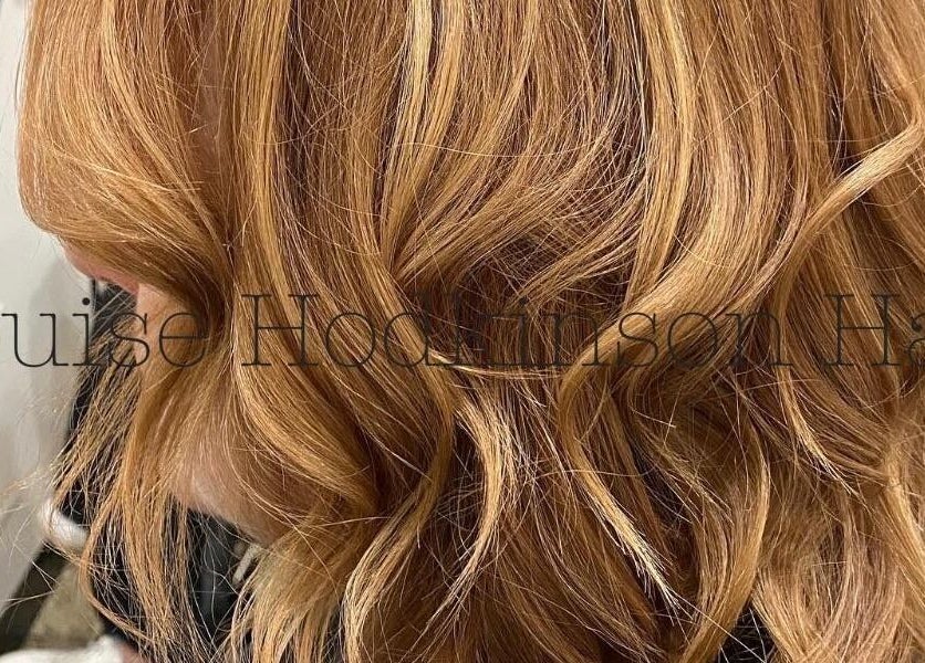 Wavy auburn hairstyle at Louise Hodkinson Hair in Yeerongpilly, Queensland, AU.