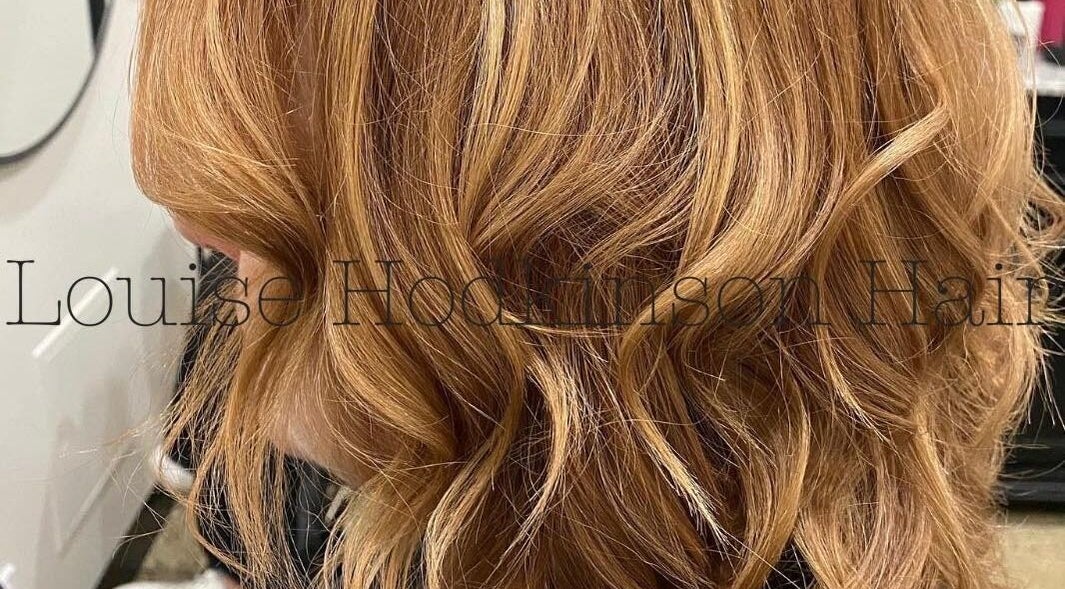 Wavy auburn hairstyle at Louise Hodkinson Hair in Yeerongpilly, Queensland, AU.