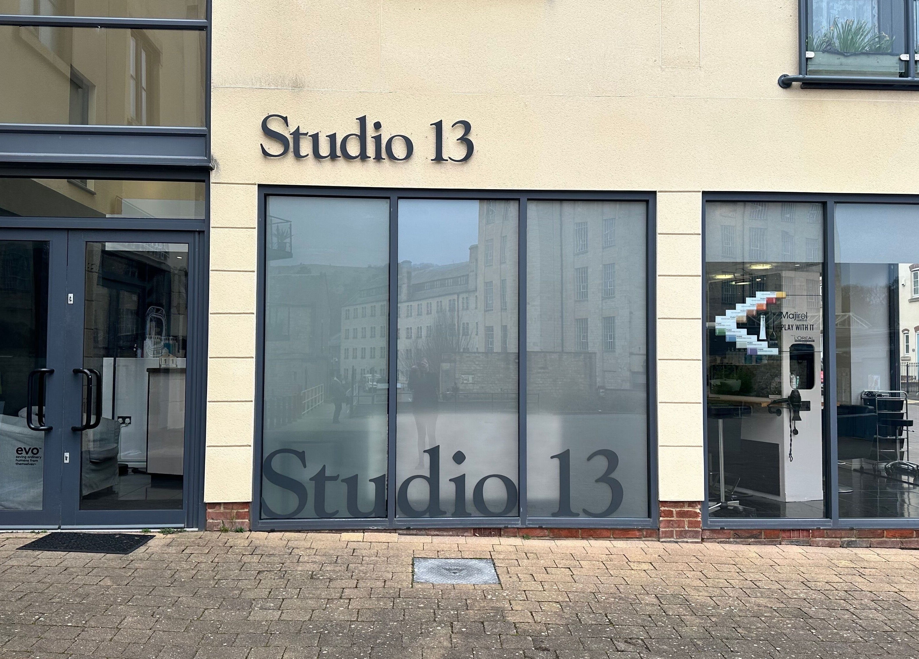 Facade of Studio 13 'A Salon Collective for Independent Stylists' in Ebley, England, GB.