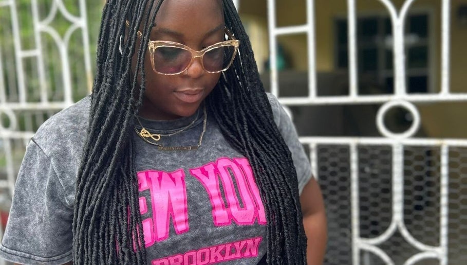 Woman with stylish braids at Loc'd Hause JA, Spanish Town, St. Catherine Parish, JM.
