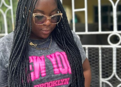 Woman with stylish braids at Loc'd Hause JA, Spanish Town, St. Catherine Parish, JM.