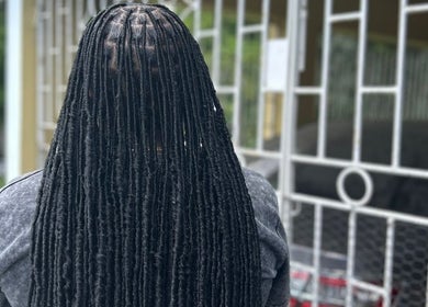 Stylish long dreadlocks at Loc'd Hause JA in Spanish Town, St. Catherine Parish, JM.