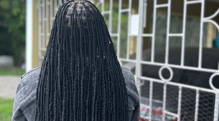 Stylish long dreadlocks at Loc'd Hause JA in Spanish Town, St. Catherine Parish, JM.