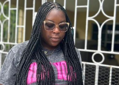 Guest with locs and sunglasses at Loc'd Hause JA, Spanish Town, St. Catherine Parish, JM.