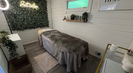 Relaxing treatment room at Beautique Beauty Studio, Warninglid, England, GB with cozy decor and calming ambiance.