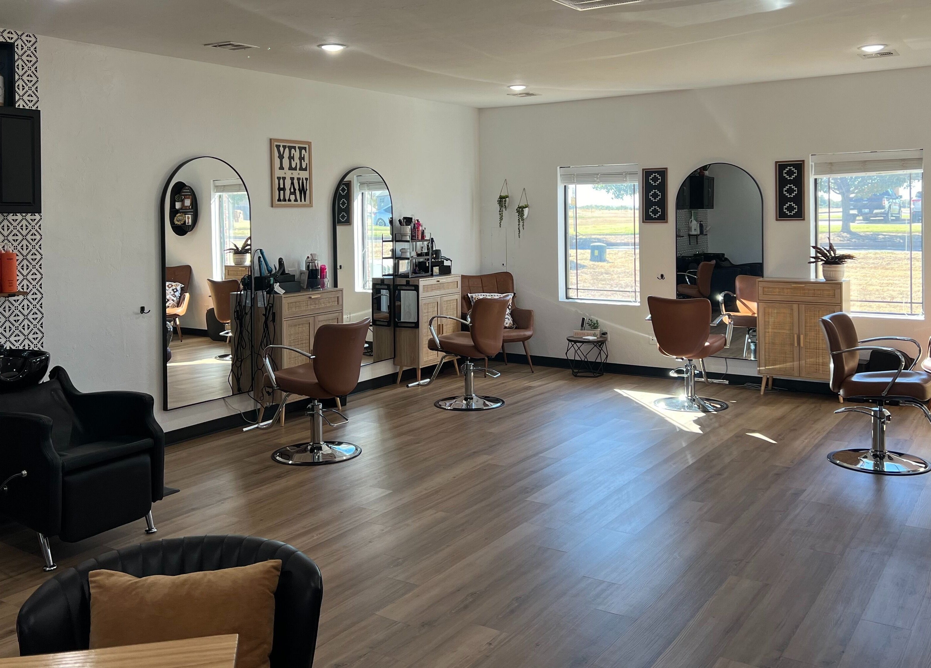 Chic interior of TruRadiance Esthetics salon in Piedmont, Oklahoma, US featuring modern styling chairs and decor.