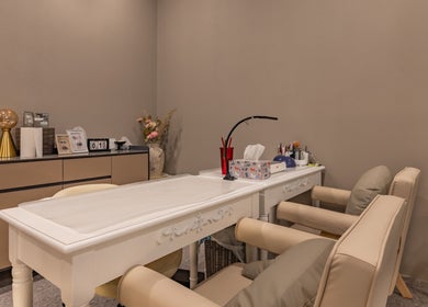 Chic nail station at Deevo Hair Salon, Melbourne, Victoria, AU, showcasing a stylish and comfortable setup.