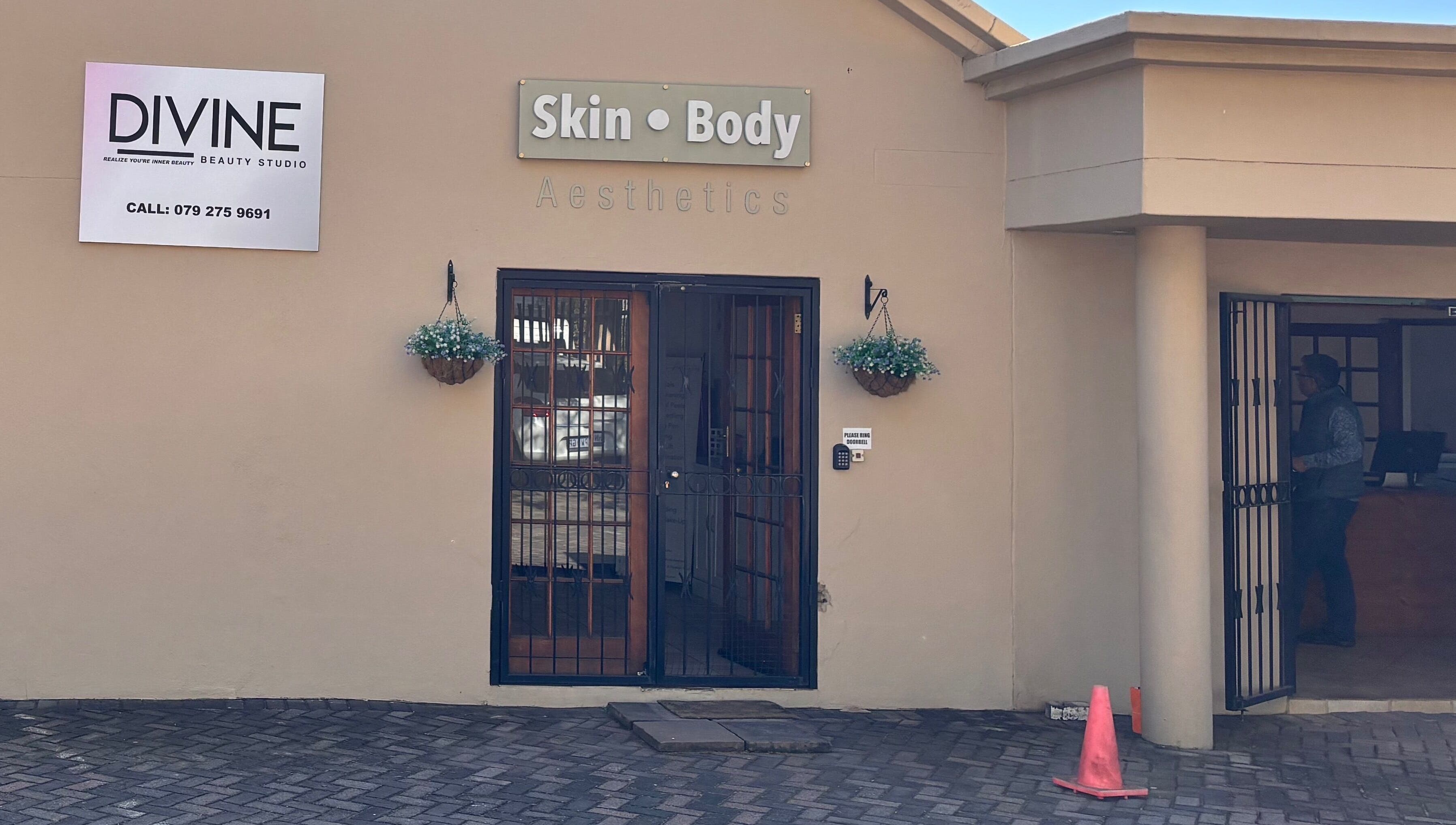 Entrance of Divine Beauty Studio, Pretoria, Gauteng, ZA showcasing chic and modern decor.