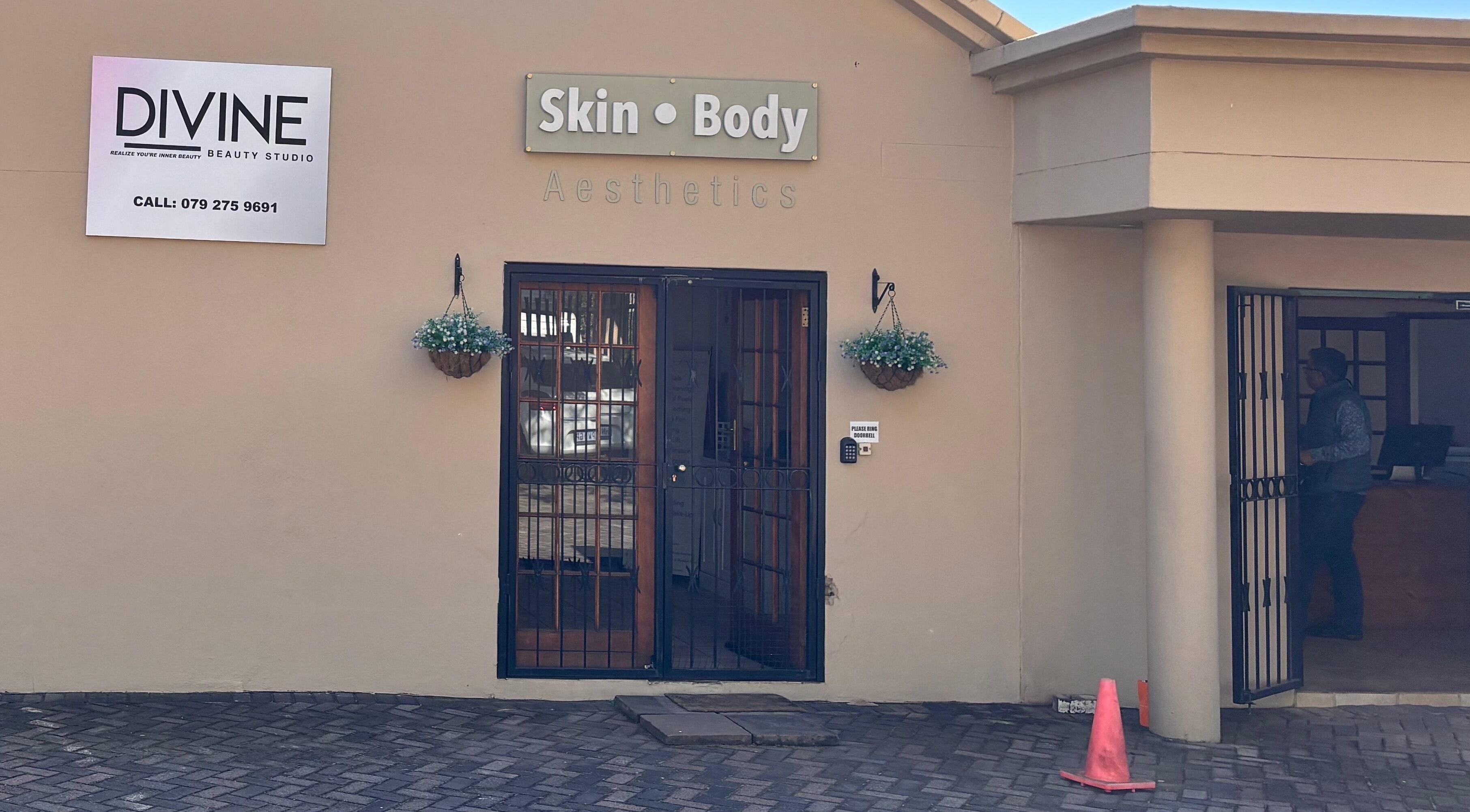 Entrance of Divine Beauty Studio, Pretoria, Gauteng, ZA showcasing chic and modern decor.