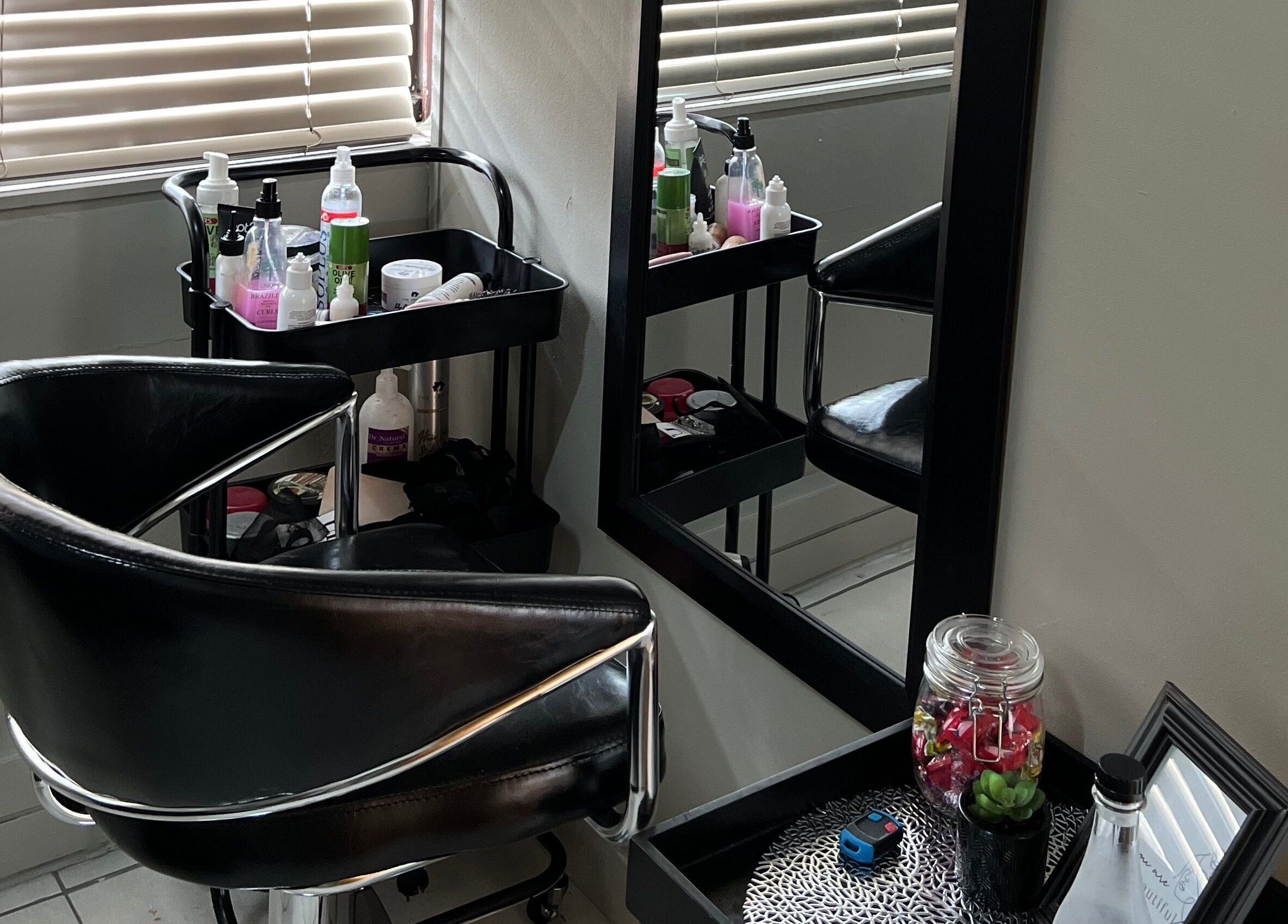 Stylish salon chair and mirror at Ubuhle Bebhudango Beauty Studios, Ga-nala, Mpumalanga, ZA.