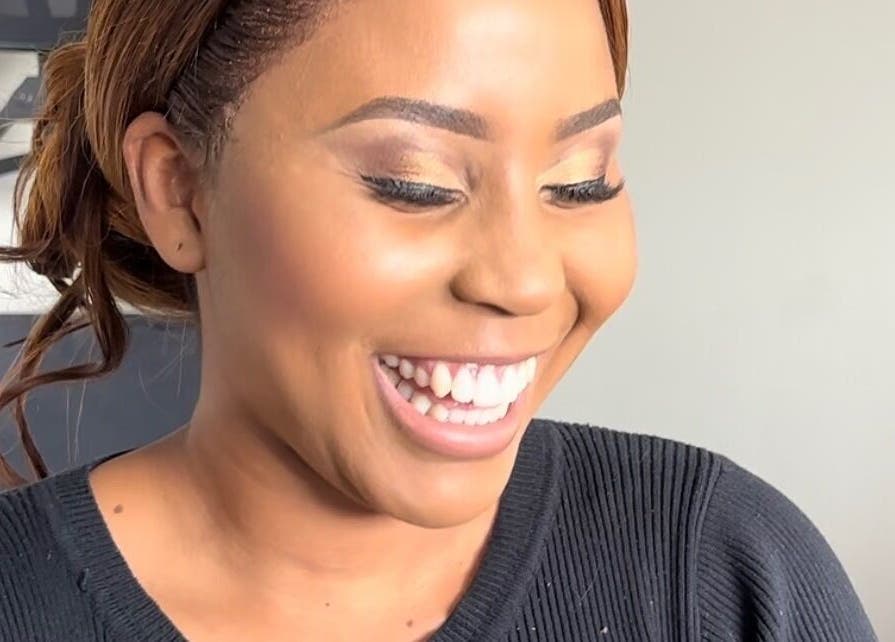 Client smiling at Ubuhle Bebhudango Beauty Studios, Ga-nala, Mpumalanga, ZA, showcasing a flawless makeup look.