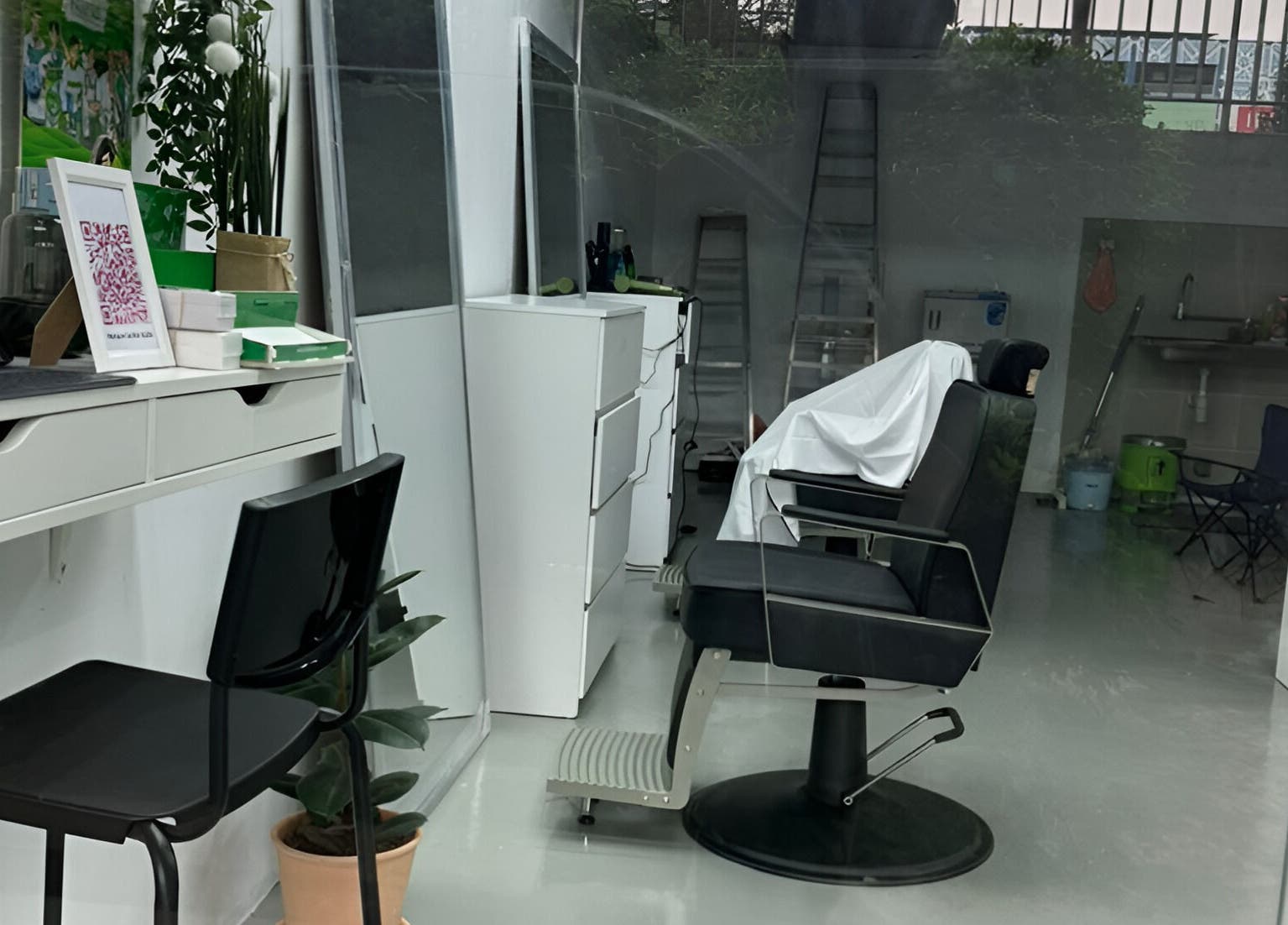 Modern interior of MENCAVE BARBER STUDIO, Shah Alam, Selangor, MY with sleek chairs and stylish decor.