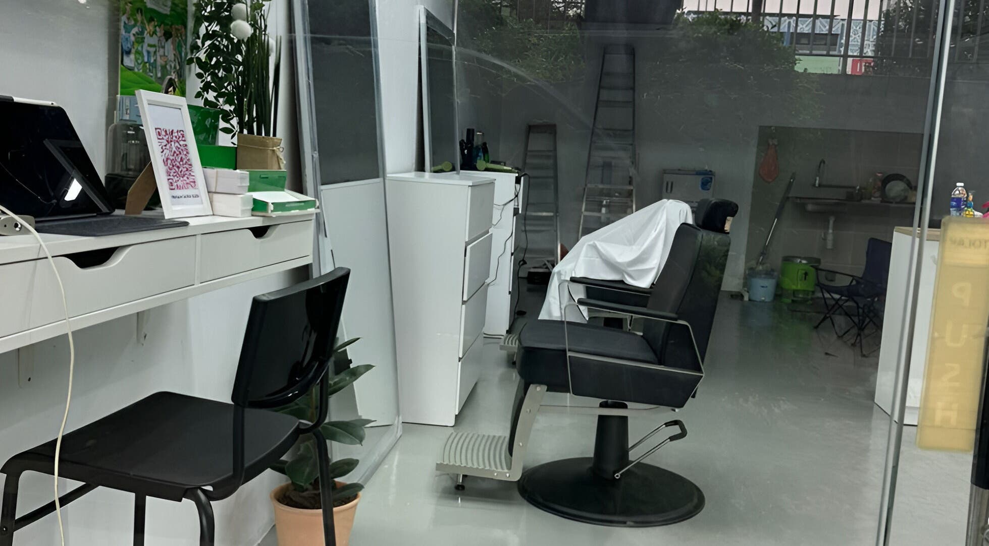 Modern interior of MENCAVE BARBER STUDIO, Shah Alam, Selangor, MY with sleek chairs and stylish decor.