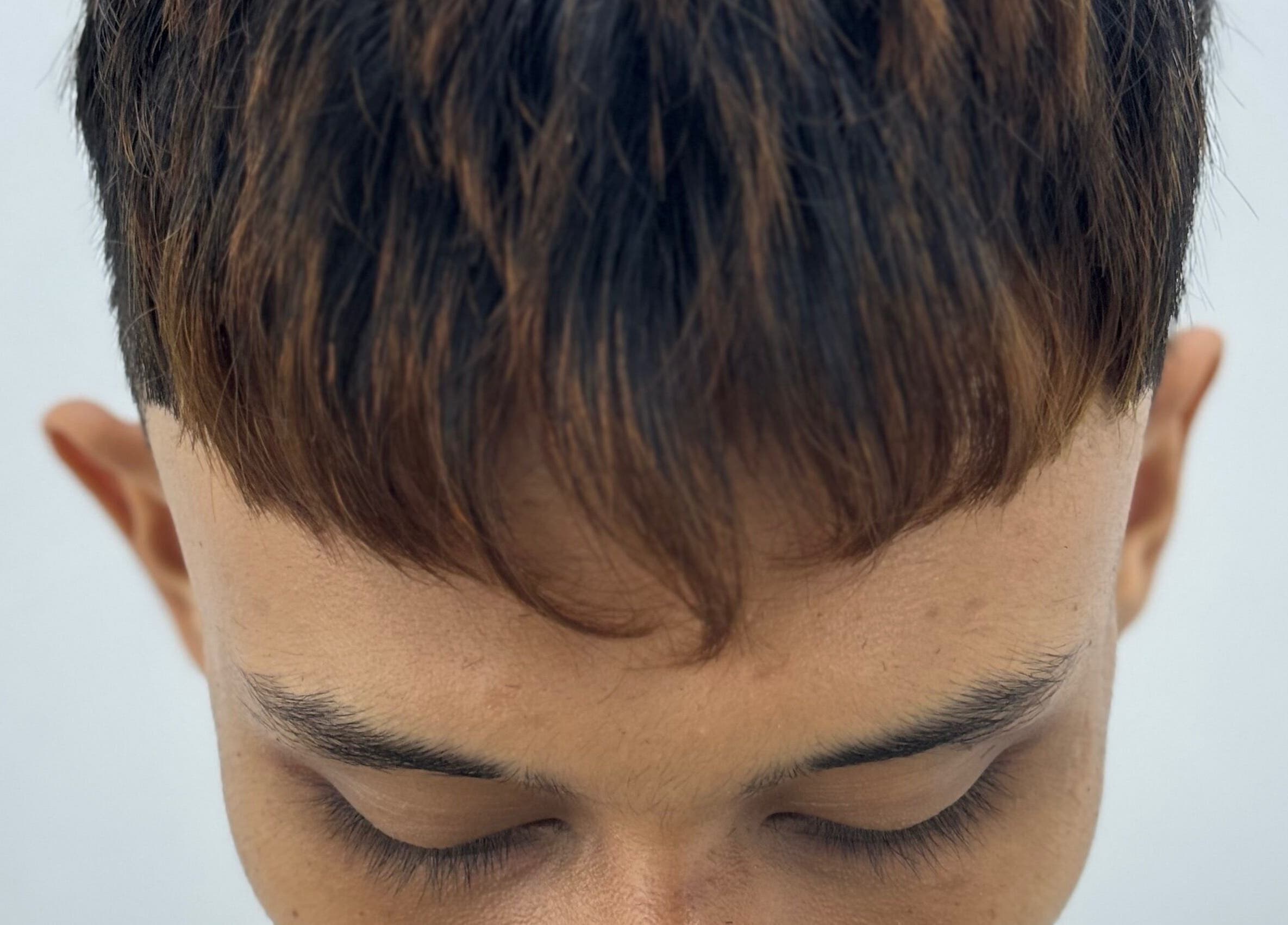 Close-up of stylish haircut at MENCAVE BARBER STUDIO, Shah Alam, Selangor, MY.