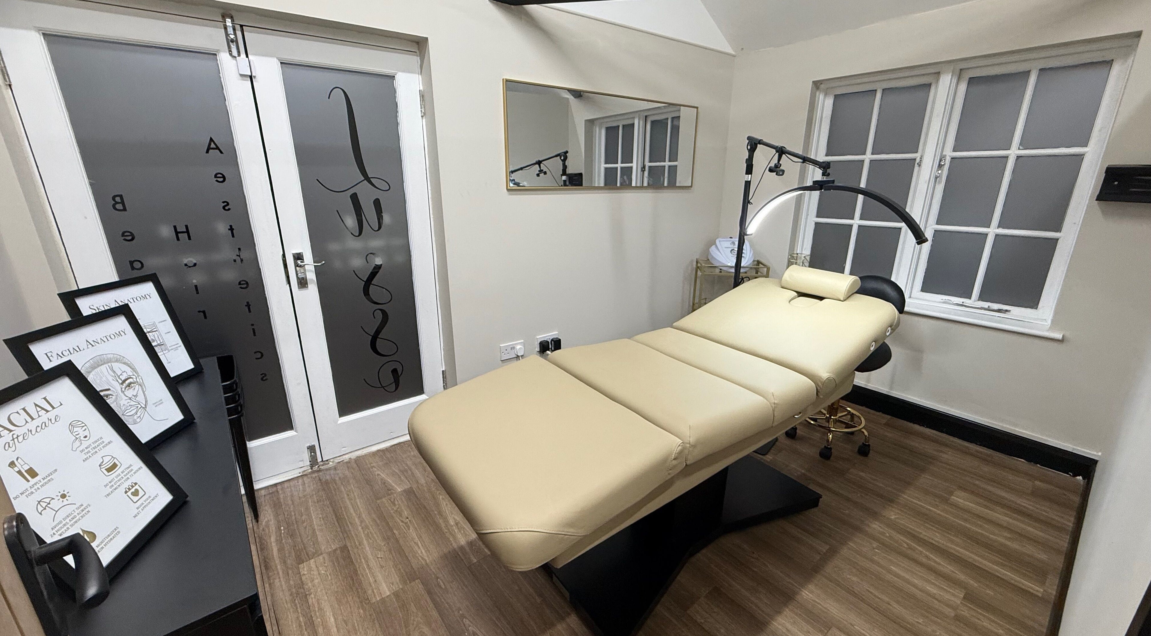 Treatment room at Lusso Aesthetics Hair & Beauty in Braintree, England, GB featuring a luxury massage bed.