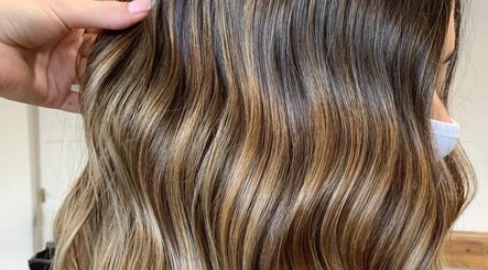 Beautiful wavy blonde hair transformation at No10 Hair and Beauty in Duffield, England, GB.