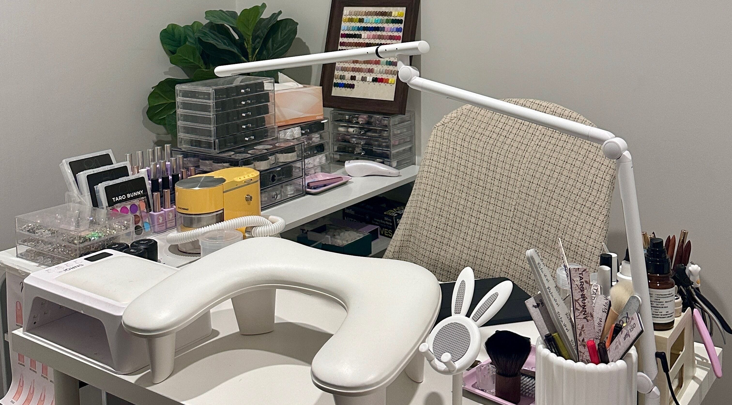 Cozy nail station at Summer-Nails in Melbourne, Victoria, AU, featuring tools and polish neatly organized.