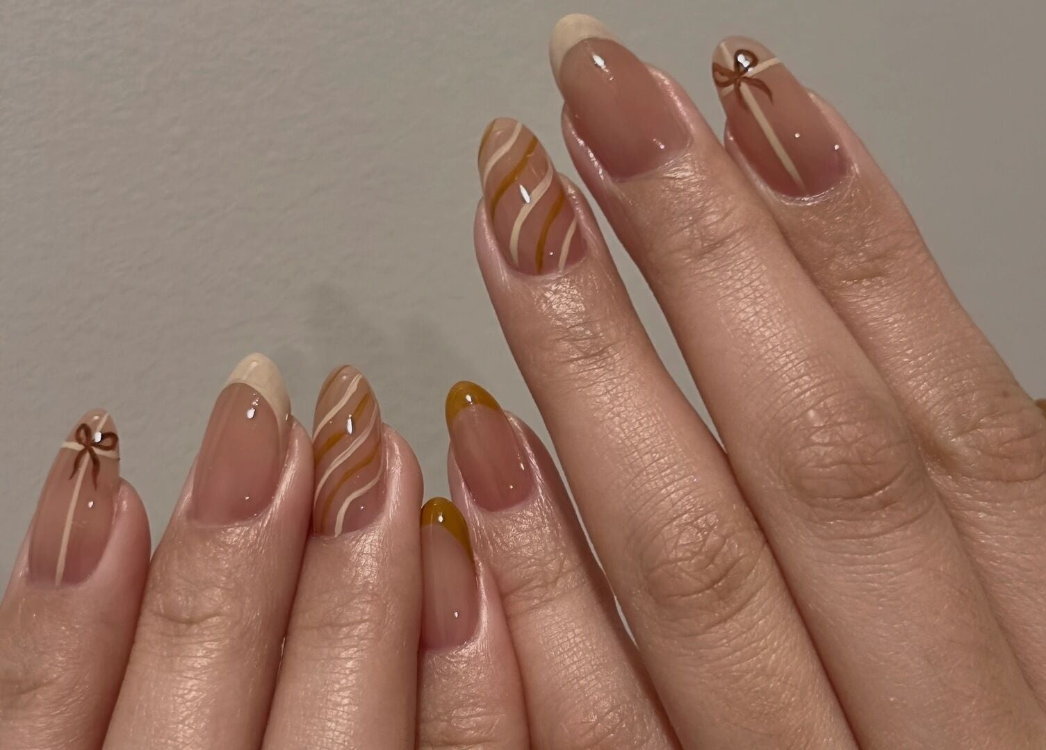 Nail art with swirls at Summer-Nails, Melbourne, Victoria, AU. Featuring brown and beige designs.