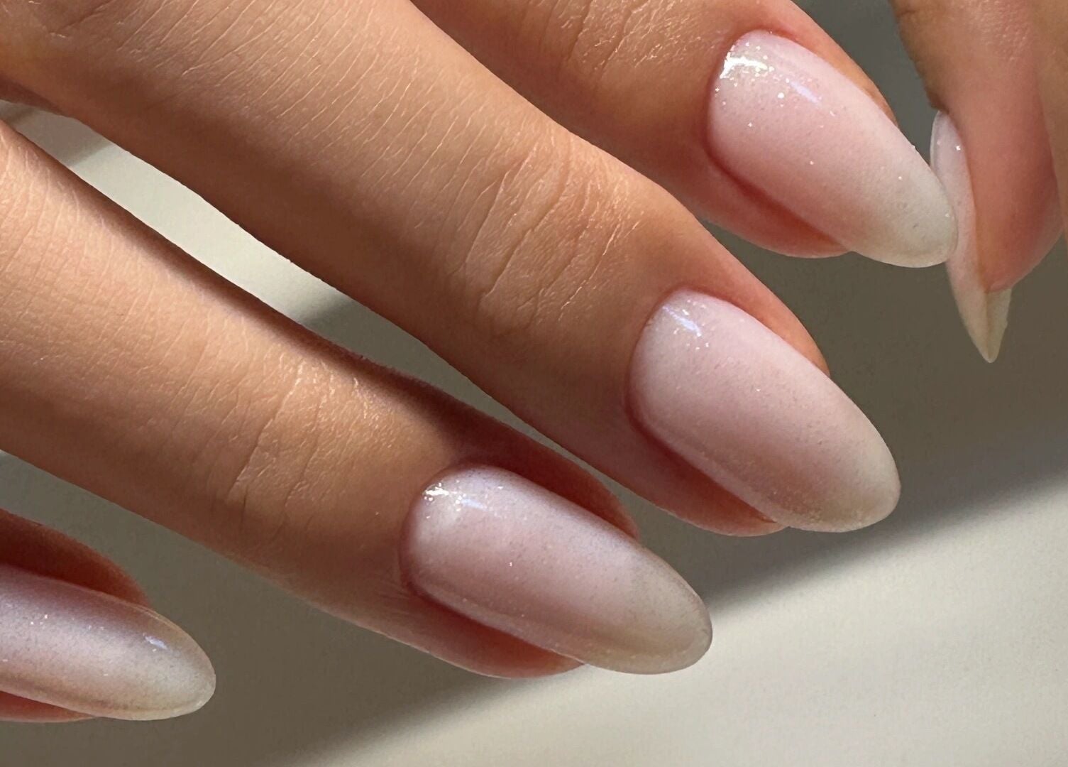 Close-up of manicured nails with a soft, elegant design at Summer-Nails, Melbourne, Victoria, AU.