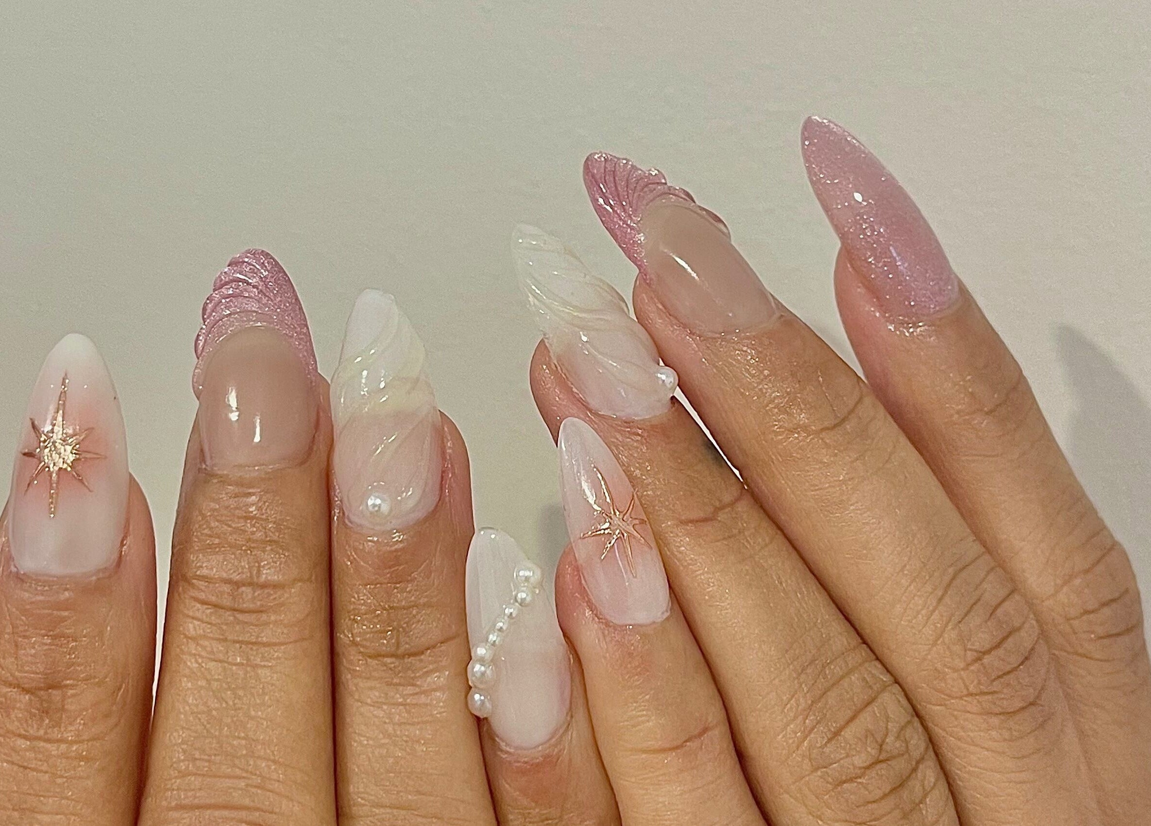 Glittering pink nails with star design at Summer-Nails, Melbourne, Victoria, AU.