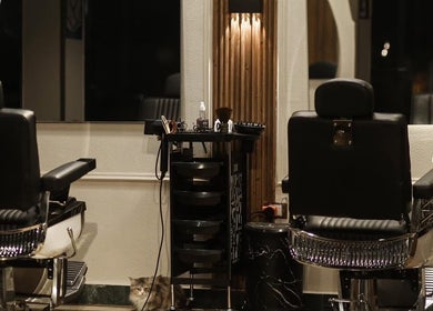Elegant salon chairs and styling station at 224 By Fadi Salon, Cairo Governorate, Cairo Governorate, EG.