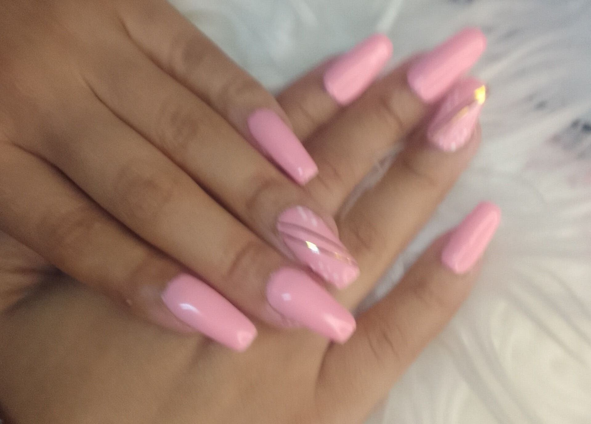 Pink acrylic nails at Sharlon Beuti Bar, Cape Town, Western Cape, ZA.