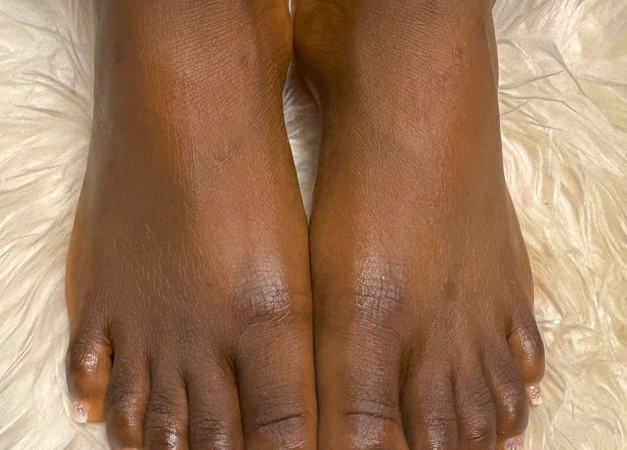 Pampered feet on soft fabric at Sharlon Beuti Bar, Cape Town, Western Cape, ZA enhancing wellness and comfort.