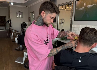 Barber styling at Sweeney Todds Barbers, Arjan, Dubai, AE, showcasing expert grooming services.