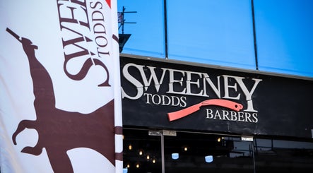 Sweeney Todds Barbers sign at Arjan, Dubai, AE, showcasing sleek, modern design and appealing aesthetics.