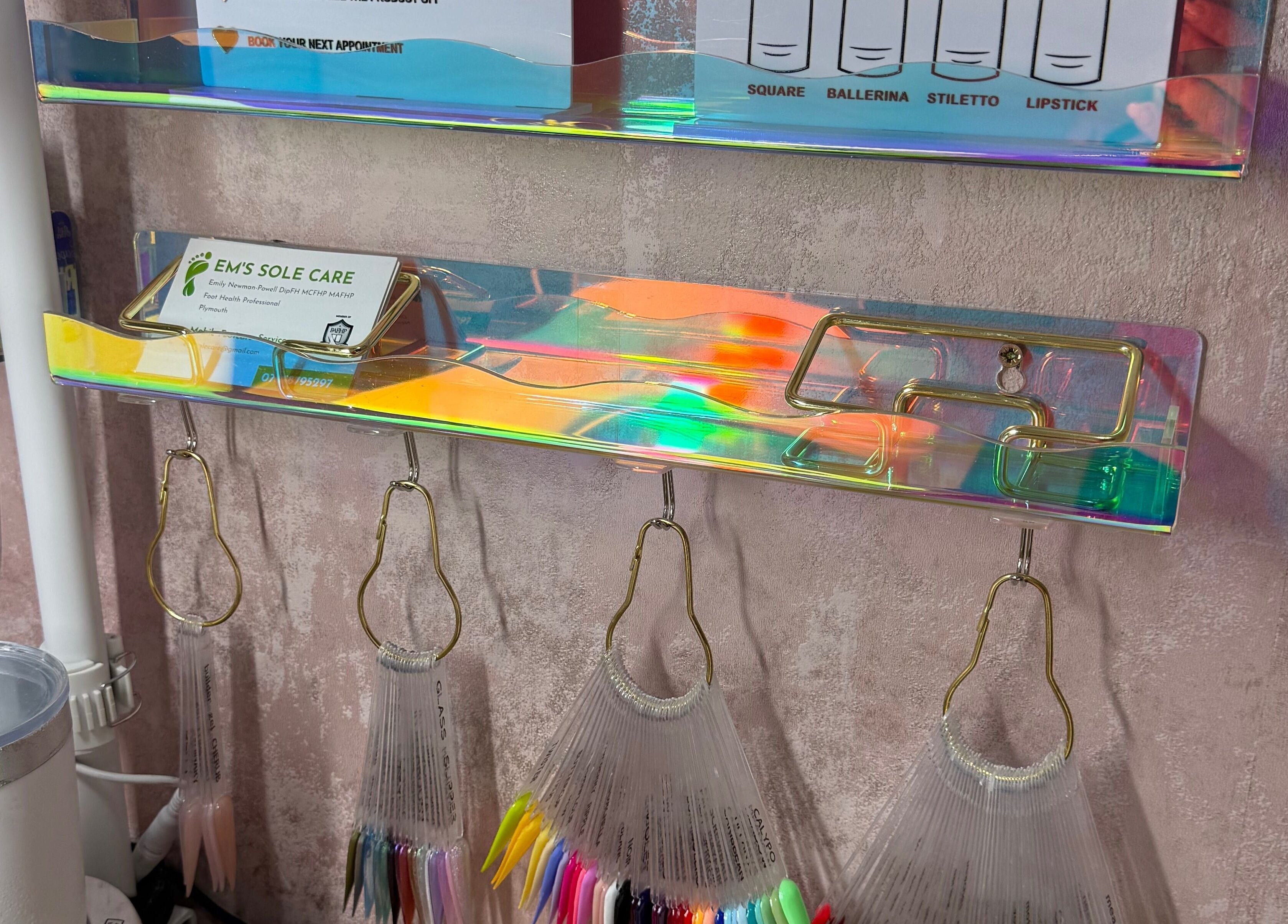 Holographic display showcasing nail colors at Gemini Nails, Plymouth, England, GB.