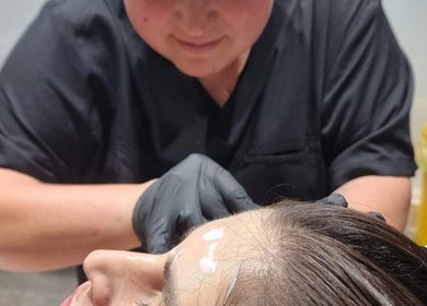 Facial treatment at Jolanta PAŁKA | Witney Beauty & Aesthetics, Witney, England, GB, with a beautician.