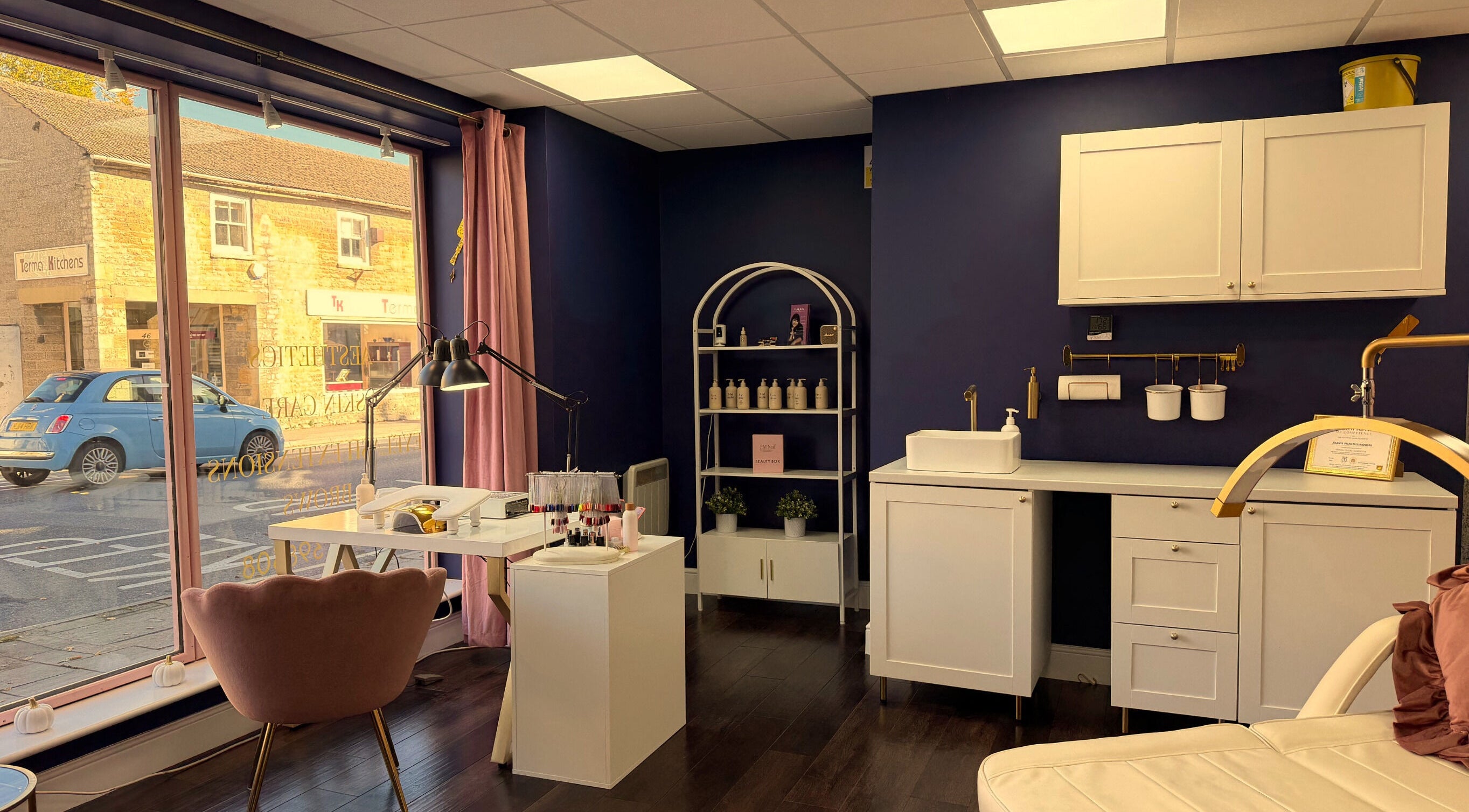 Jolanta Palka spa in Witney, England, GB with chic decor and cozy seating area.