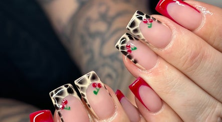 Elegant cherry-themed nail design at Nefarious Nails, Golden Bay, Western Australia, AU. Bold and stylish art.