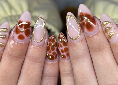 Intricate gold and red nail art by Nefarious Nails, Golden Bay, Western Australia, AU.