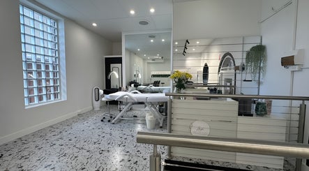 Modern interior of Angel Hair & Lash Studio, Melbourne, Victoria, AU with stylish decor and treatment bed.
