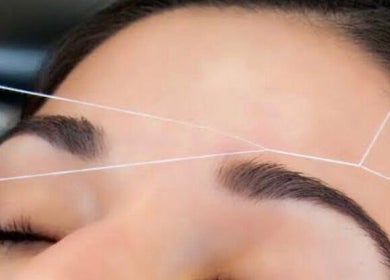 Eyebrow threading service at Angel hair & lash studio in Melbourne, Victoria, AU showcasing precision and care.