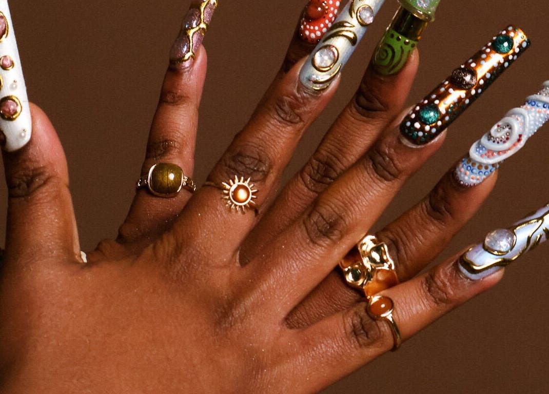 Intricate nail art at StudioEDN in Mount Druitt, New South Wales, AU, showcasing unique patterns and colors.