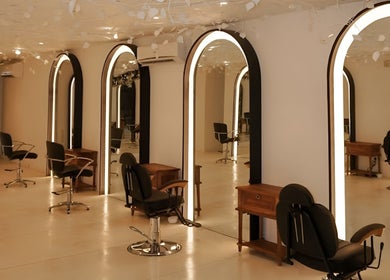 Chic salon chairs and mirrors at Jaal Salon, Colombo, Western Province, LK, showcasing modern elegance.