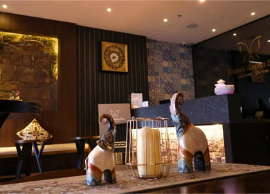 Elegant interior decor of Rama Rama Spa in Kota Kinabalu, Sabah, MY with warm lighting and artistic touches.