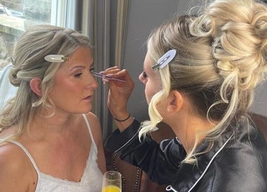 Bridal makeup application at Beauty by Anna May in Burnley, England, GB. Expert artist enhances bride's look.
