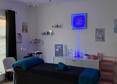 Tranquil treatment room at Synergy Skin And Body Studio in Cape Town, Western Cape, ZA, showcasing a massage table.