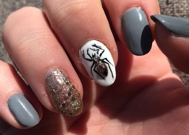 Intricate nail art with spider design at Synergy Skin And Body Studio, Cape Town, Western Cape, ZA.