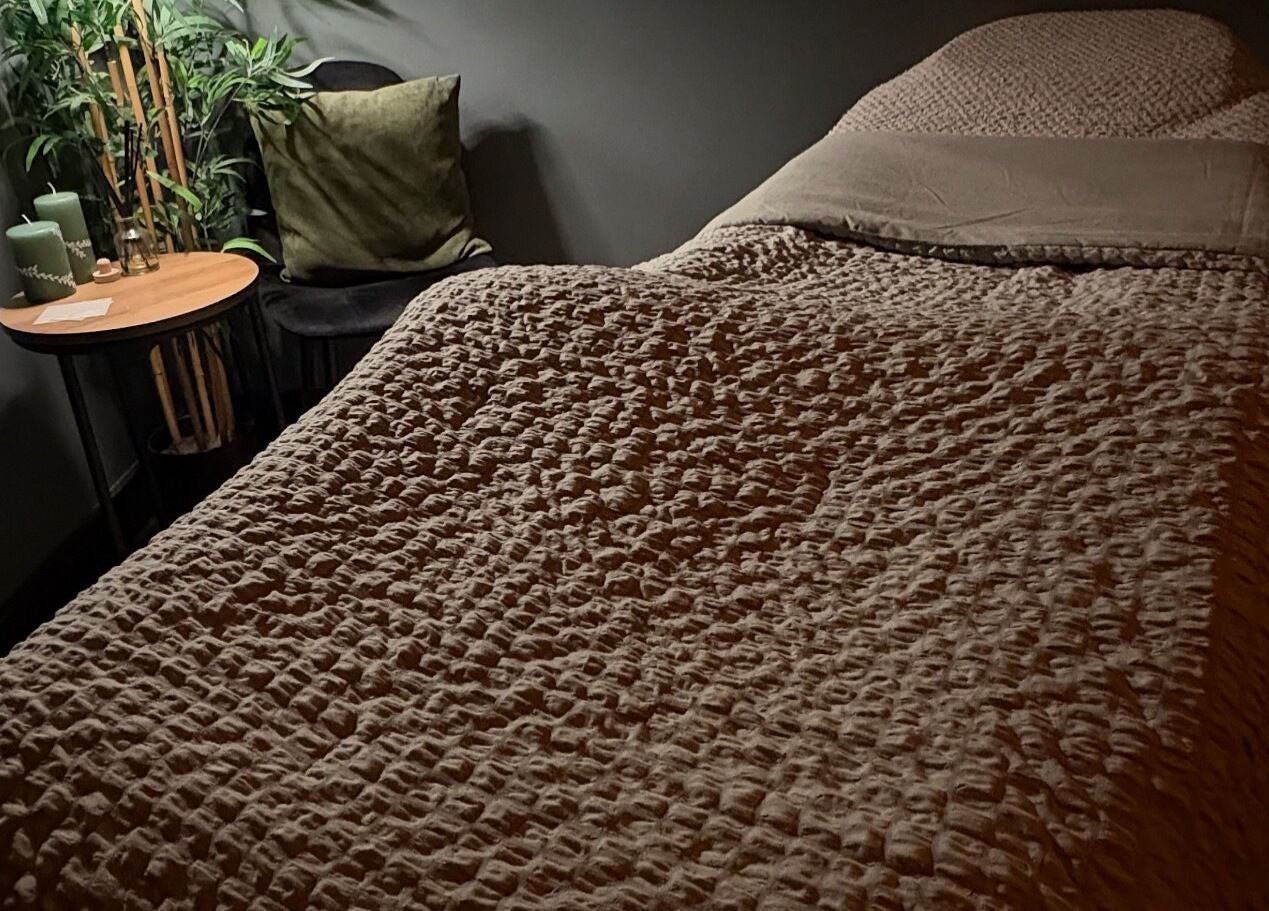 Cozy massage room at Relax & Restore Massage Therapy in Basingstoke, England, GB soothing ambiance.