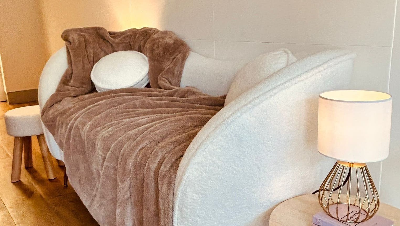 Elegant lounge area at Look at You, Poole, England, GB with plush seating and ambient lighting.