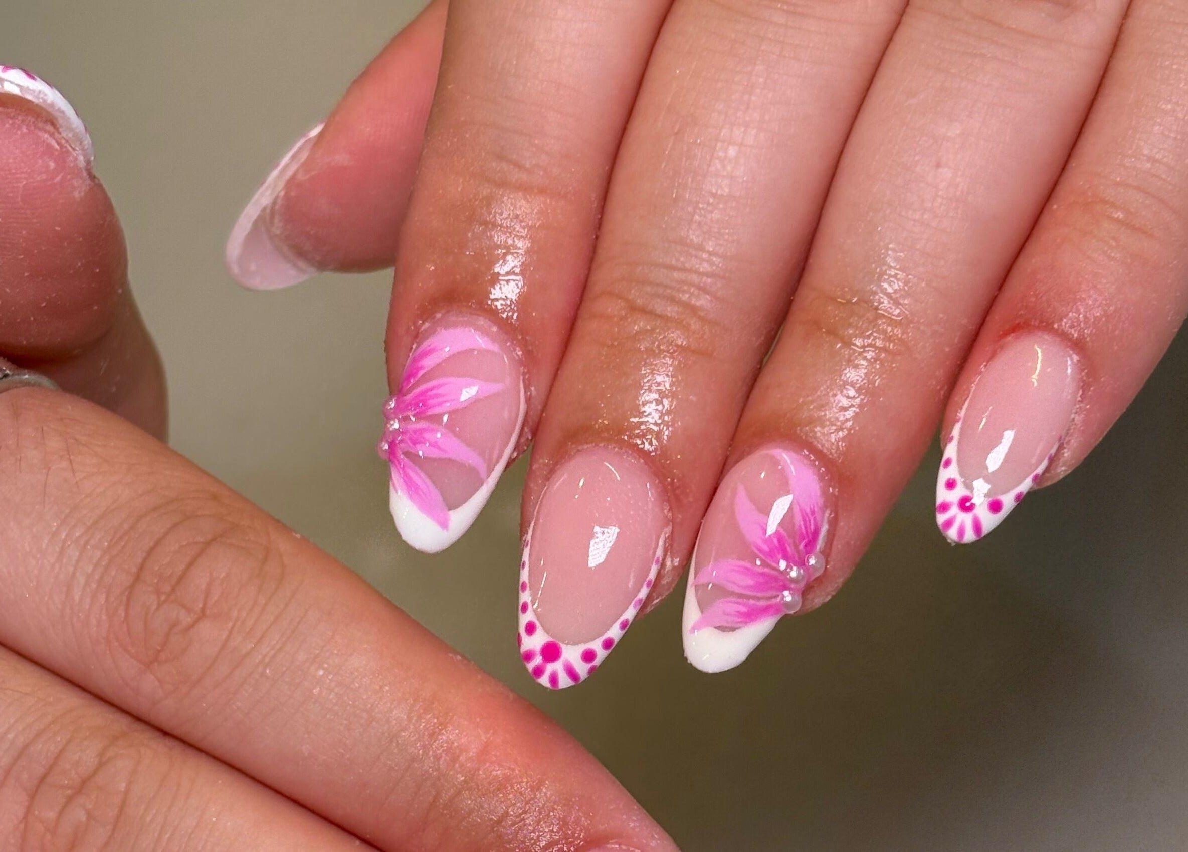 Pink floral nail art at Nails by Emily Katie, Burnley, England, GB. Elegant and detailed manicure design.