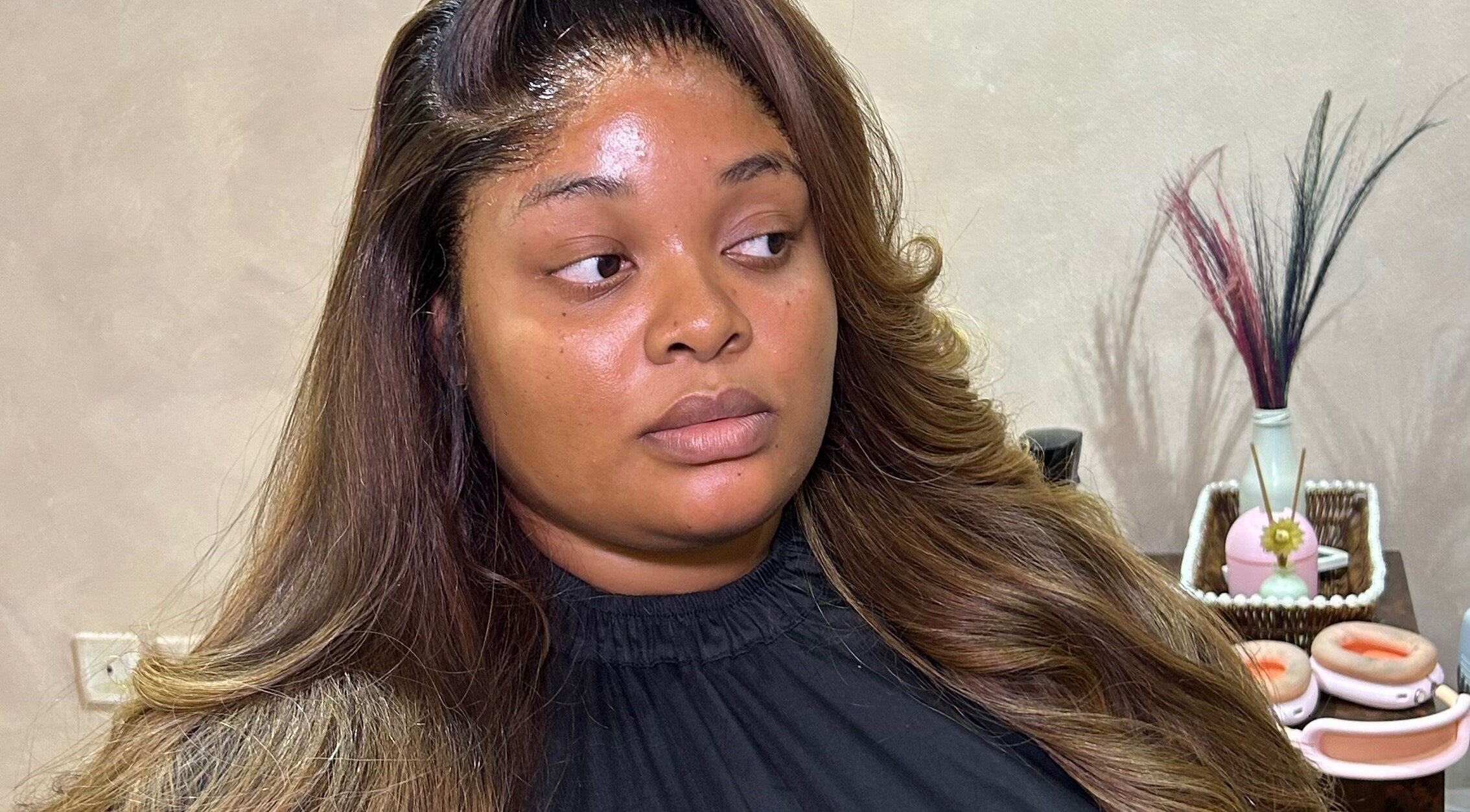 Woman with styled hair at Flawlyss Bundles, Lagos, Lagos, NG, showcasing beauty results.