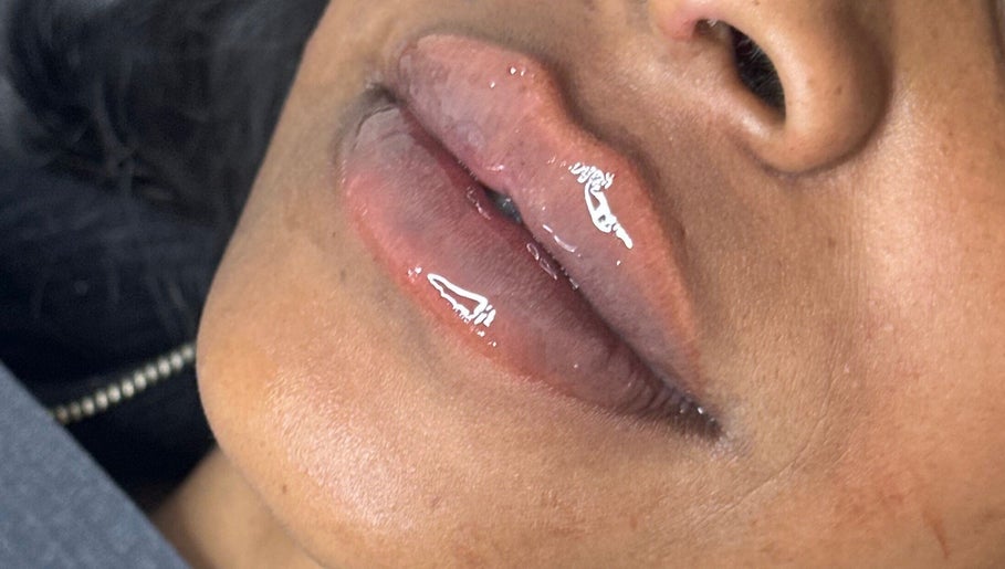 Close-up of glossy lips at Boss Babe Beauty And Aesthetics in London, England, GB.