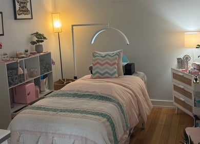 Relaxing treatment room at Blush Beauty Loft, Windsor, Ontario, CA with calming decor and soft lighting.