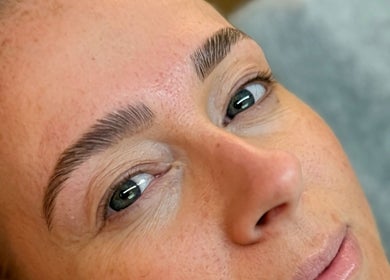 Close-up of expertly shaped eyebrows at Blush Beauty Loft, Windsor, Ontario, CA, highlighting flawless detail.